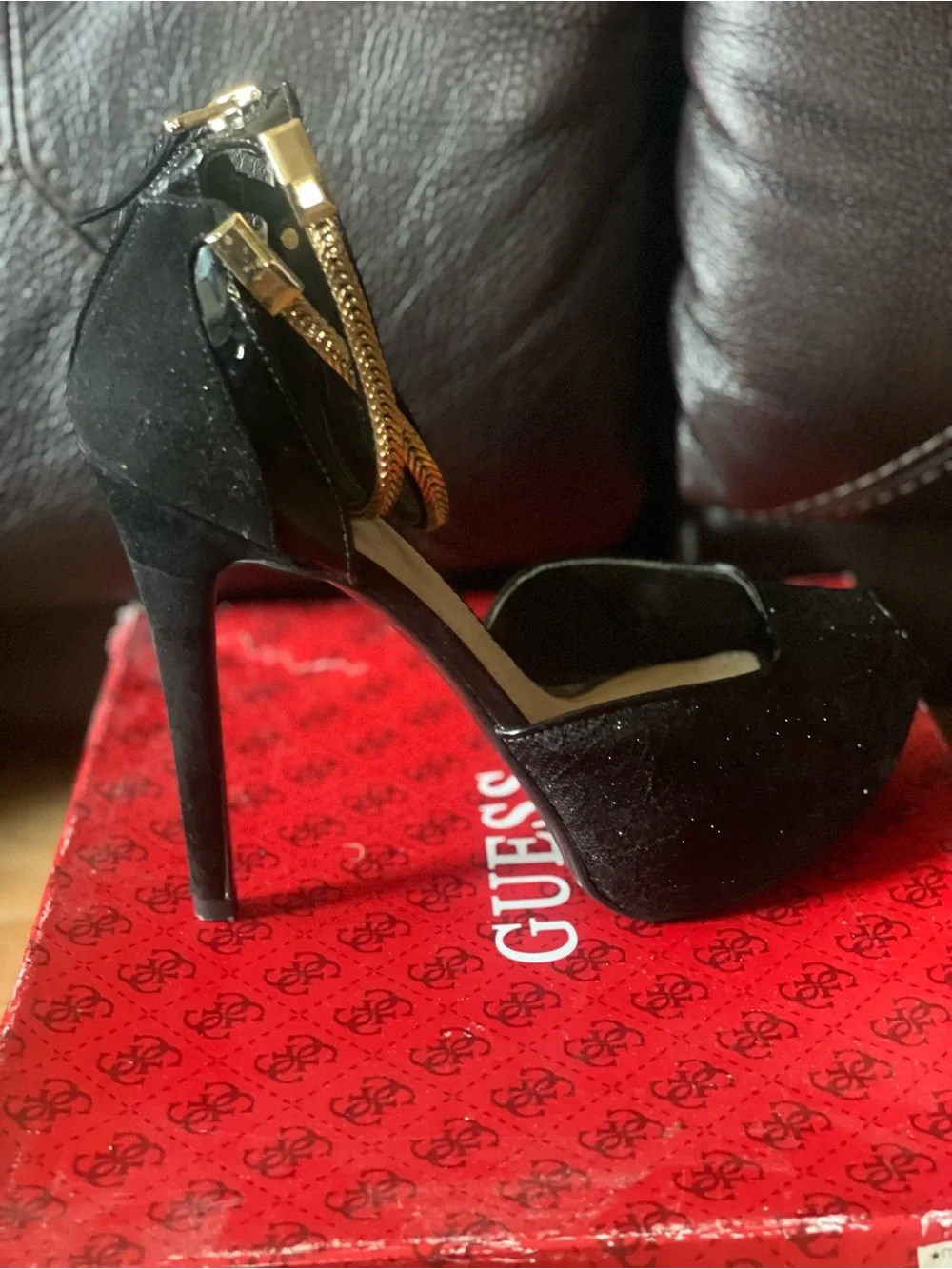 black peep-toe platform high heels by Guess featuring metallic gold double-wrap